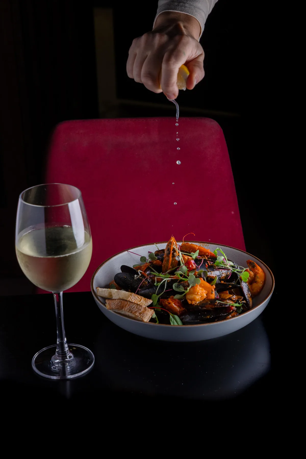 Main course with wine in Onyx dining room