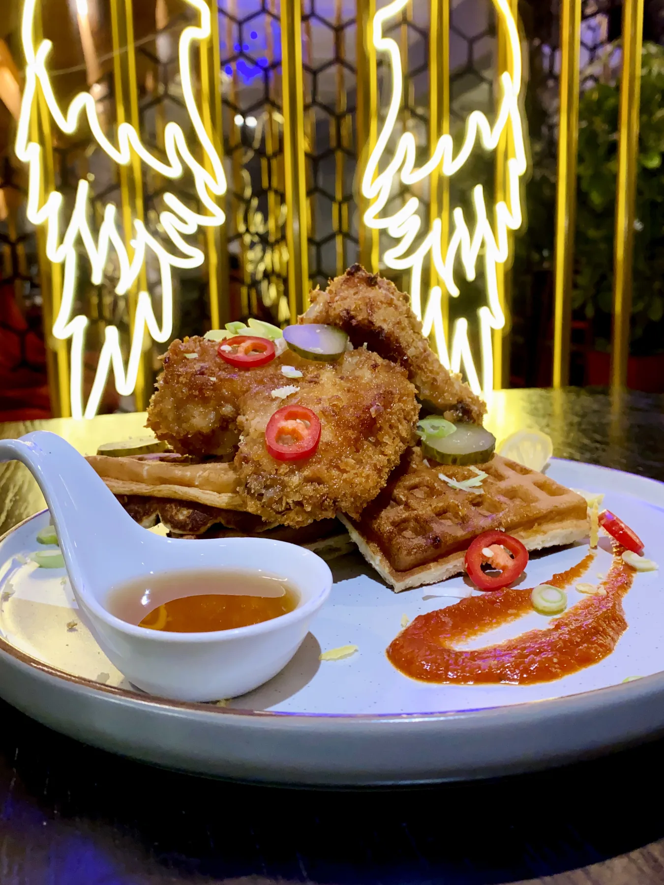 Lamb cutlet with sauce and garnish